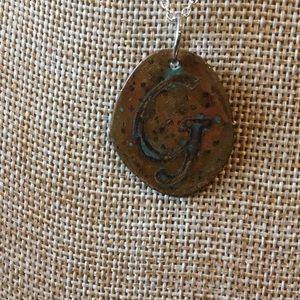 Etched copper “G” pendant